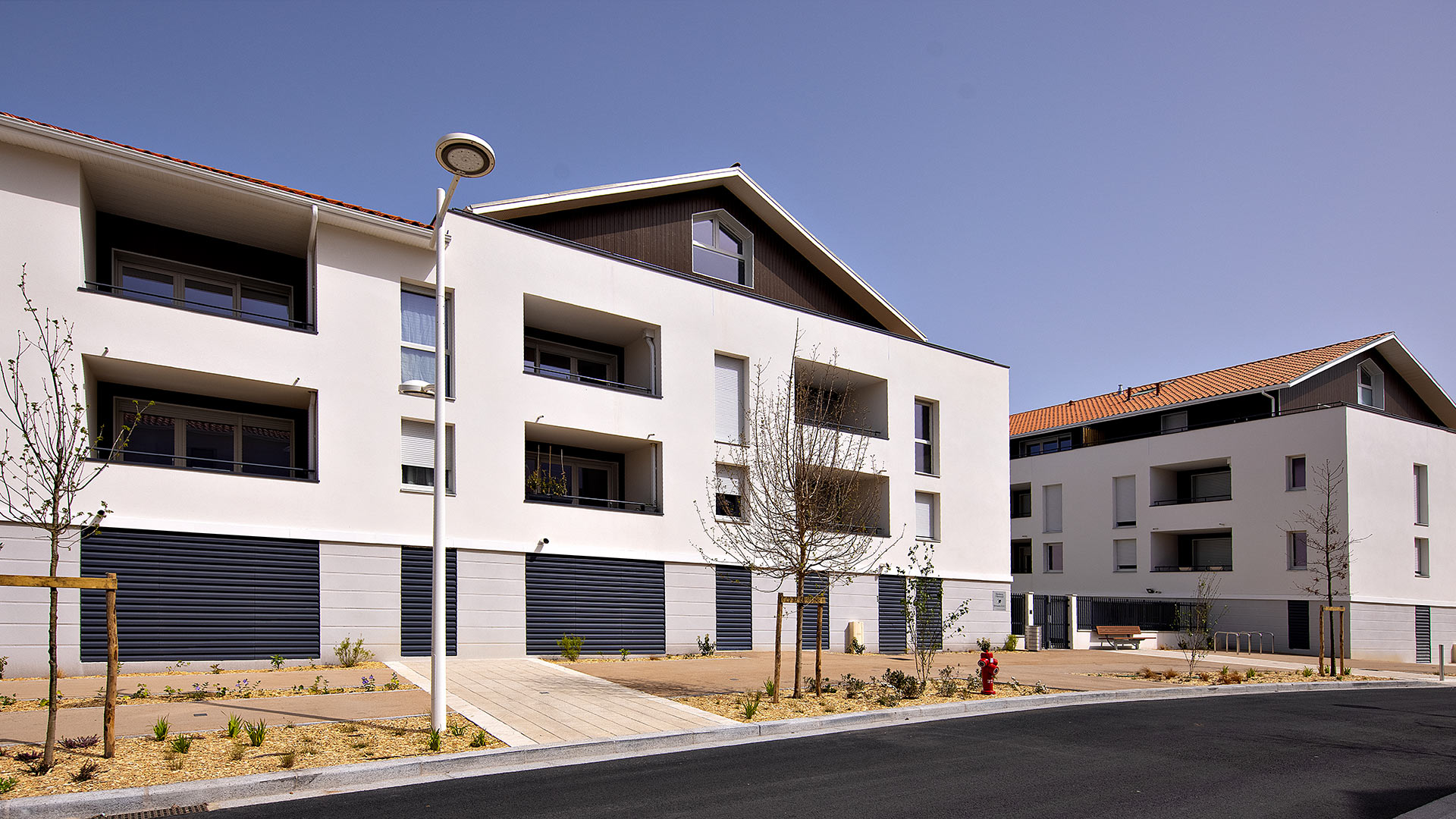 Programme immobilier neuf reprenant les codes de l'architecture landaise à Biscarrosse.